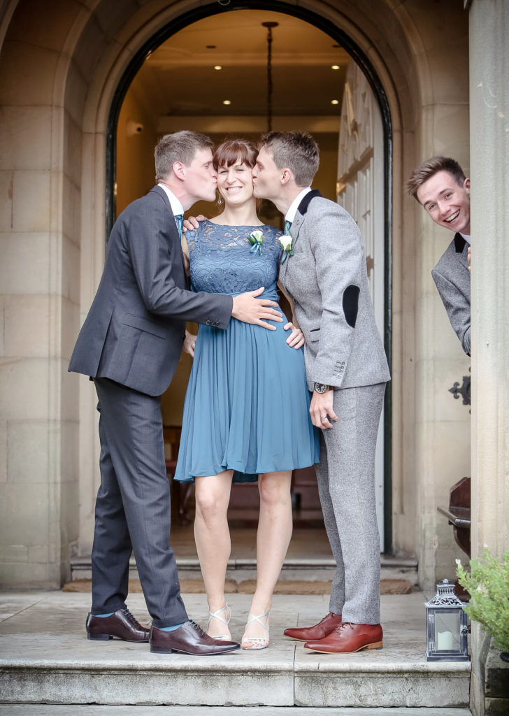 playful image of gay couple and best girl