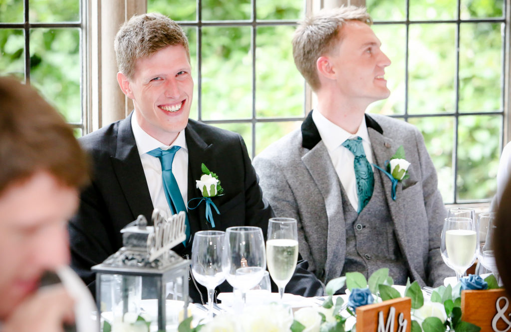 gay couple of wedding, speeches and glimpse of laugh caught