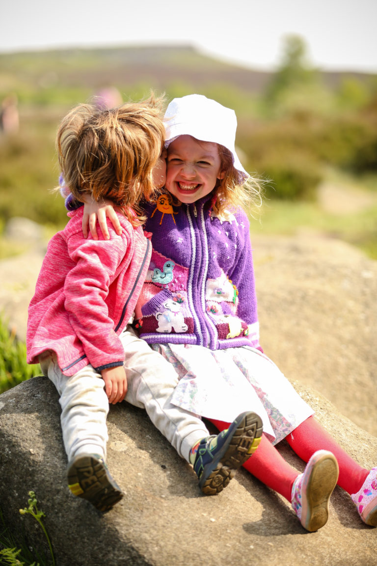 Playful siblings portrait Nottingham family photographer