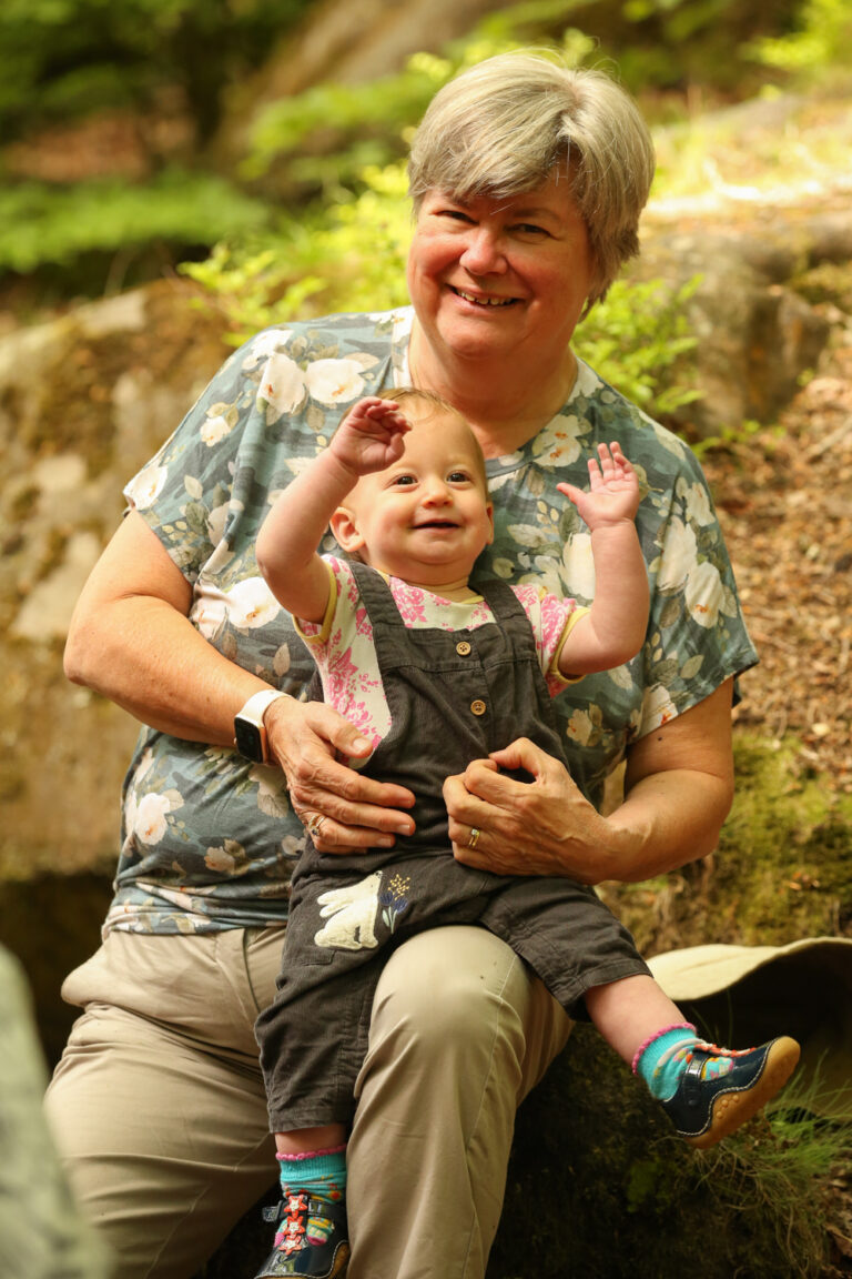 grandma and baby granddaughter in woodland
