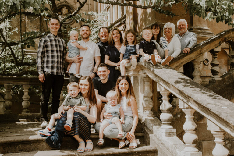 extended family on wollaton steps in family photo
