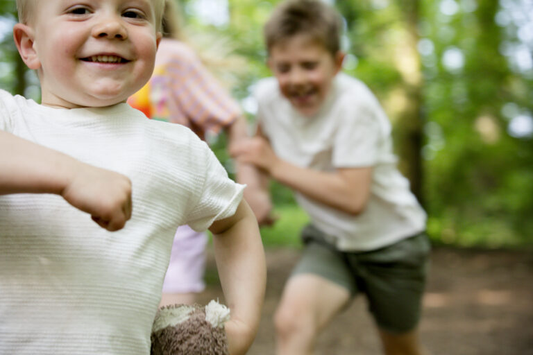 brothers running race towards camera