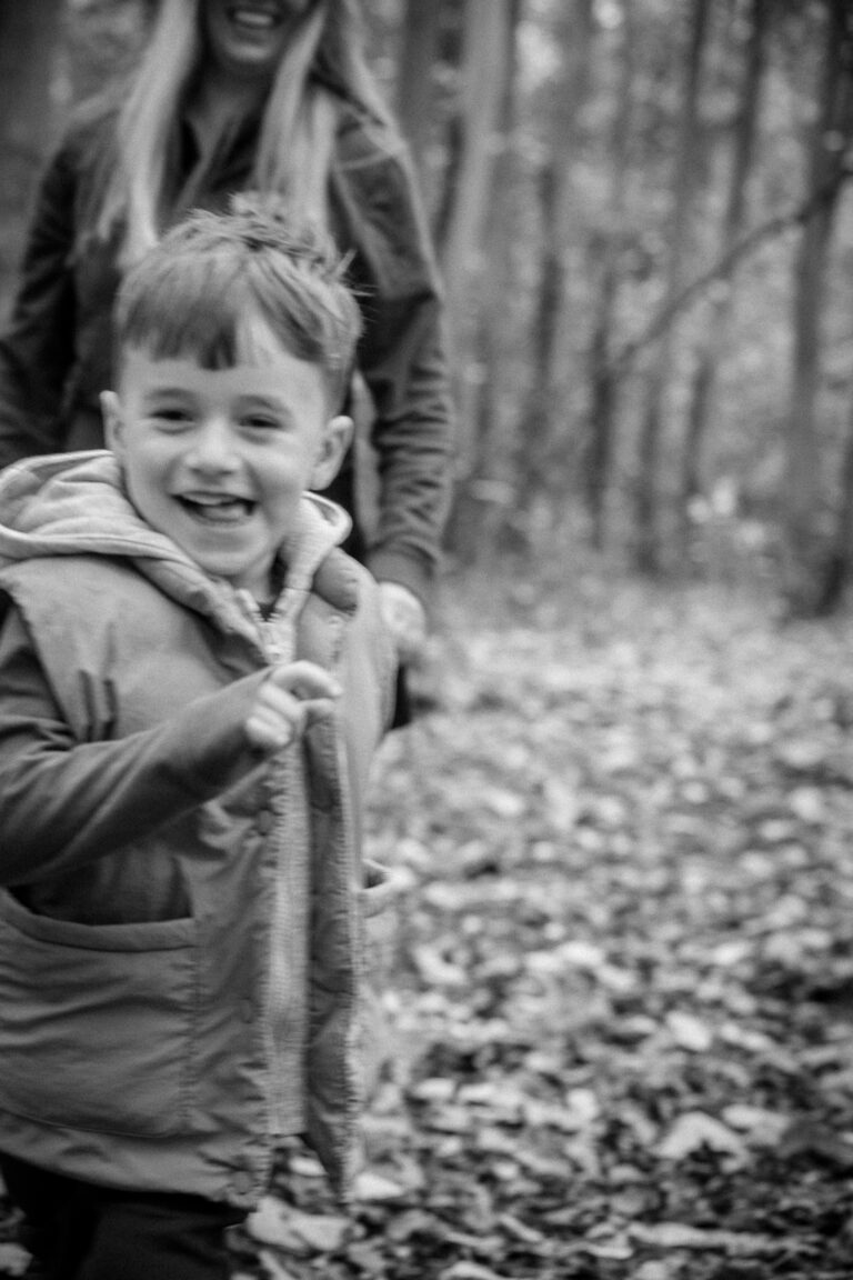 black and white boy running to camera